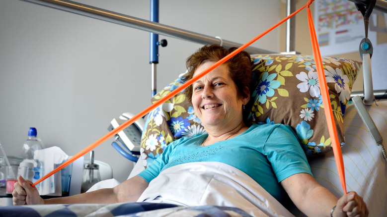 Cliënt bezig met revalidatieprogramma